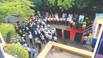 Workplace safety campaign initiatives including training sessions and awareness programs